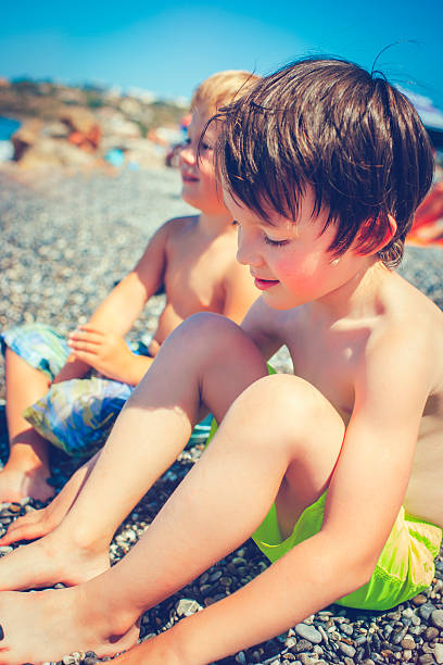 istock Children on the beach 504984646