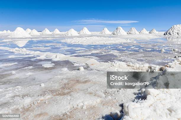 Piles Of Salt In Salar De Uyuni Bolivia Stock Photo - Download Image Now - Adventure, Altiplano, Blue