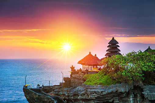 Beautiful Tanah Lot Hindu temple in Bali at sunset 