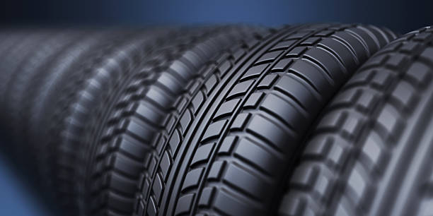 Row of rubber tire 3D, on blue background stock photo