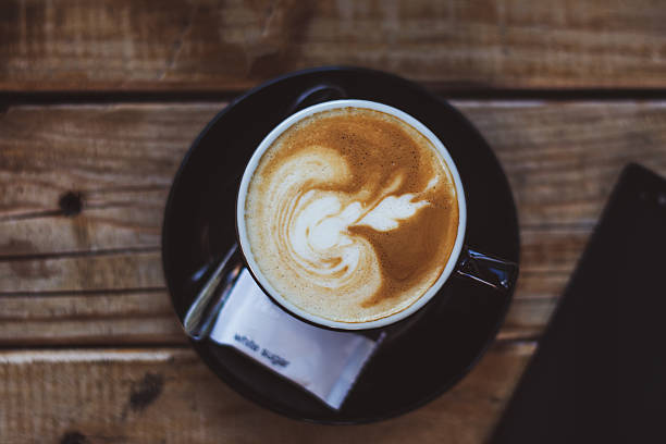 istock High angle view of coffee with cellphone in the corner 504994880