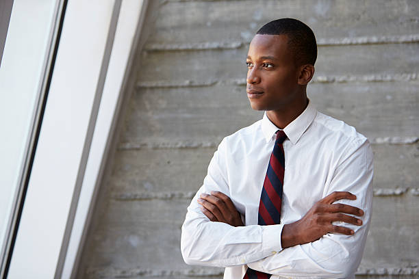 istock African American Businessman Standing Against Wall 505015532