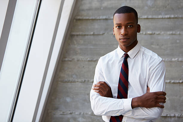 istock African American Businessman Standing Against Wall 505015726