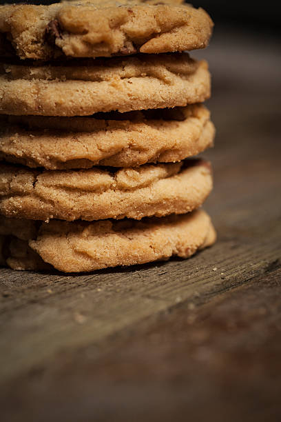 istock Stack of cookies on a rustic wooden background 505015948