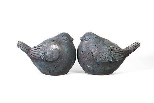 istock Two ornament loving stone birds 505016718