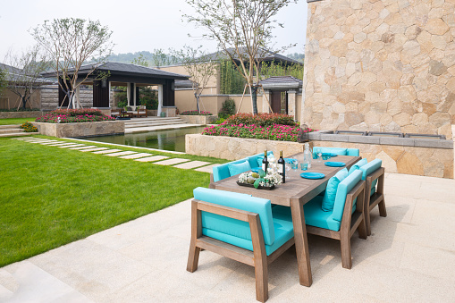 elegant furniture in the patio outside building