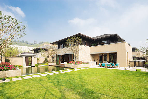 istock modern builing near meadow in blue sky 505020040