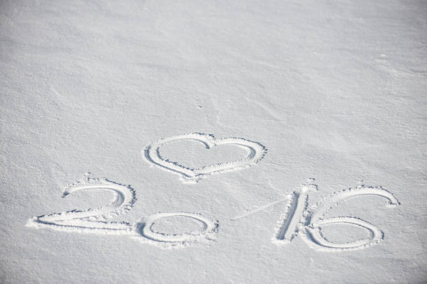 istock 2016, new year text in fresh snow 505022246