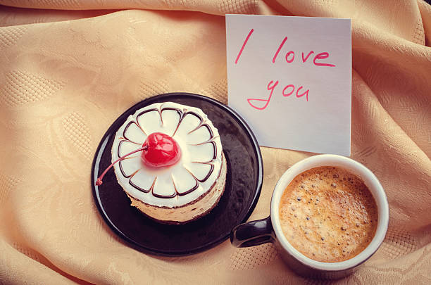istock Note I love you with cup of coffee and cake 505022650