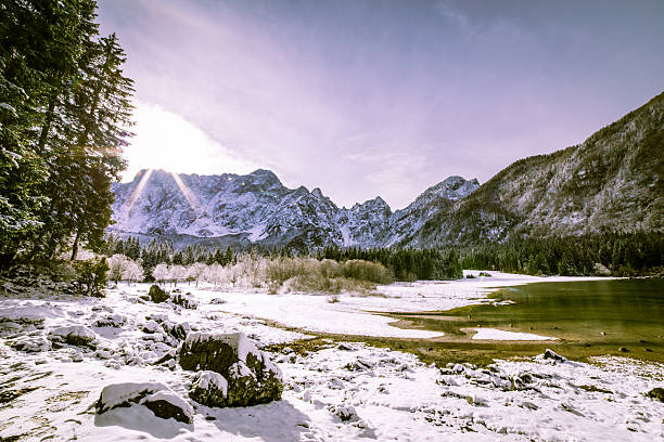 istock first snow at the mountain lake 505024432