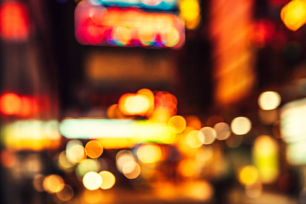 istock Blurred nighttime scene of a city 505025108