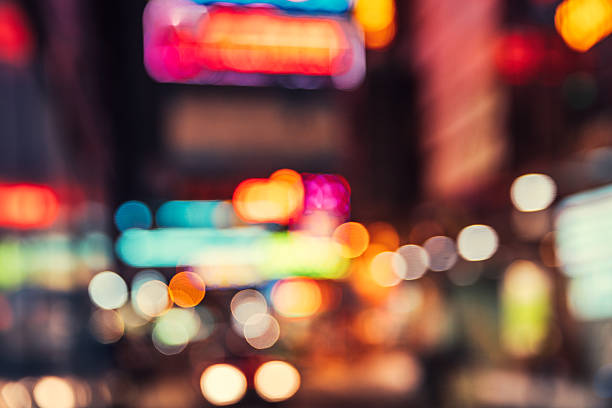 istock Blurred nighttime scene of a city 505025216