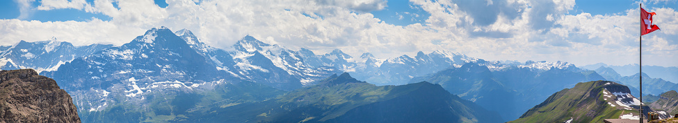 Panorama view of Bernese Alps including Jungfrau, Eiger, Monch from Faulhorn, on Bernese Oberland, Switzerland.