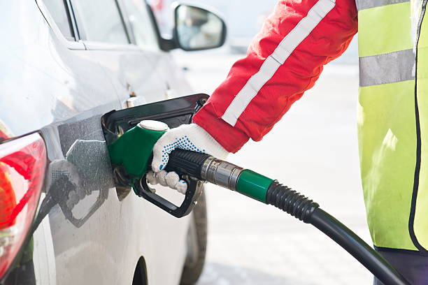 istock Fuel nozzle during refueling at a gas station. 505025836