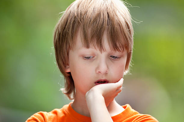 istock Portrait of a Boy Thinking 505026982
