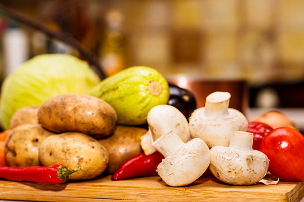Raw vegetables for stew on the black Board