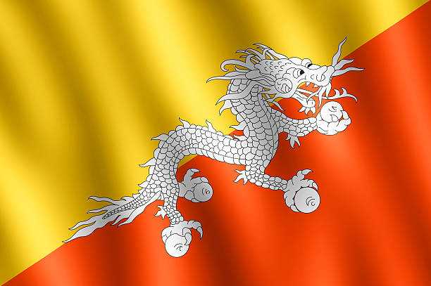 bandiera del bhutan che ondeggiano al vento - asian culture dragon textile symbol foto e immagini stock