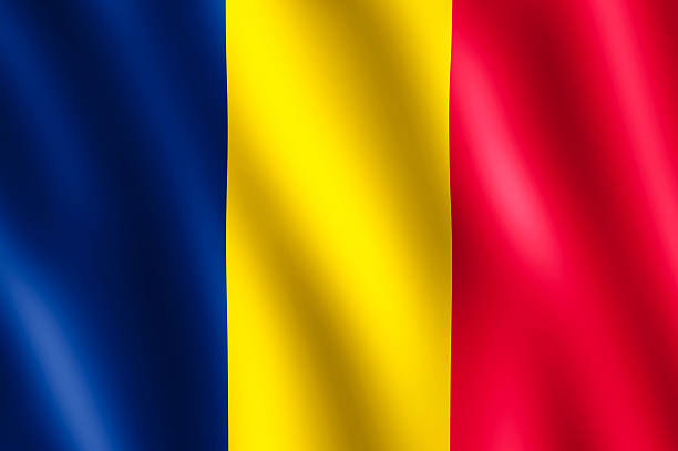 Flag of Chad waving in the wind giving an undulating texture of folds in the fabric. The Image is in the official ratio of the flag - 2:3.