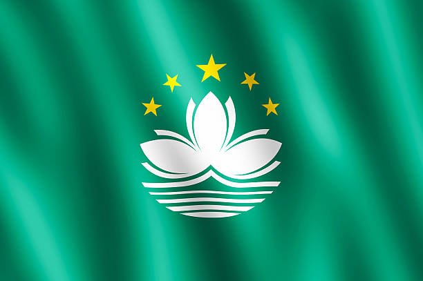 Flag of Macao waving in the wind giving an undulating texture of folds in the fabric. The Image is in the official ratio of the flag - 2:3.