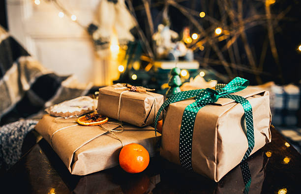 istock gifts lie on wooden table 505031178