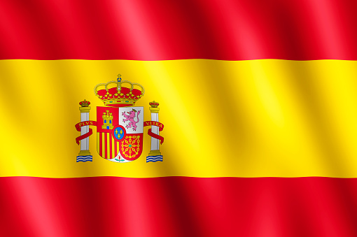 Flag of Spain waving in the wind giving an undulating texture of folds in the fabric. The Image is in the official ratio of the flag - 2:3.