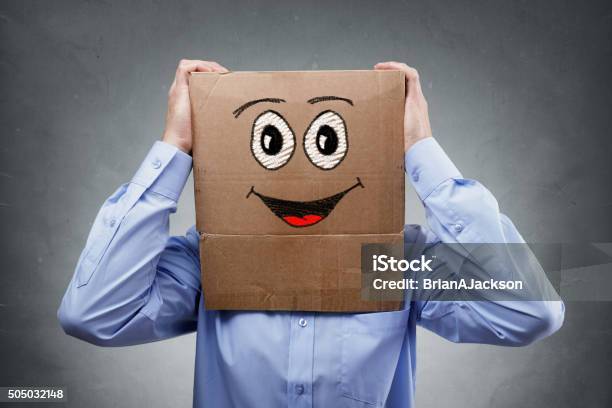 Businessman With Cardboard Box On His Head Stock Photo - Download Image Now - Anthropomorphic Smiley Face, Cardboard, Cardboard Box