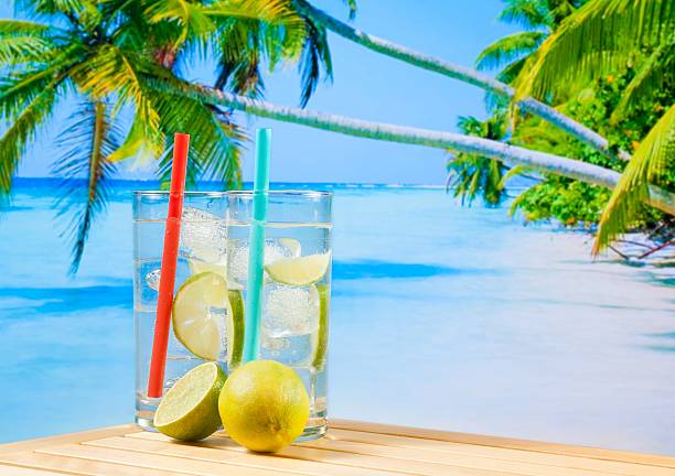 istock glasses of cocktail with lime slice 505032276