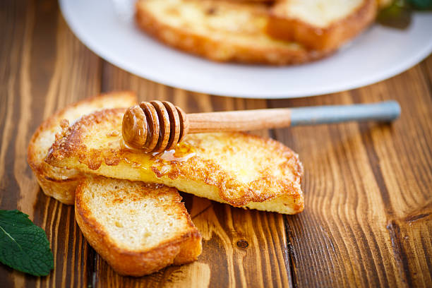 istock fried in batter toast with honey 505032568