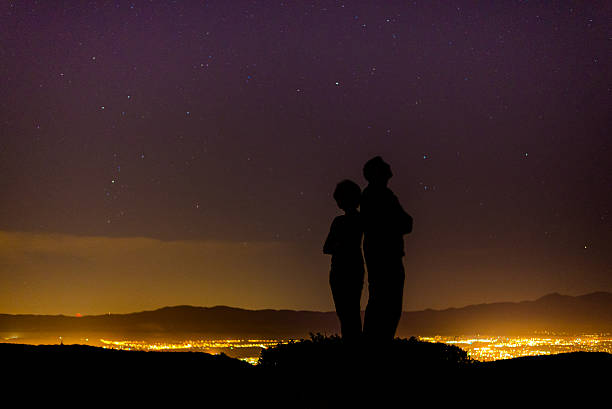 istock Silhouettes Under the Night Sky 505047505
