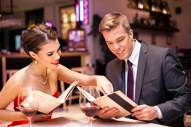 istock Elegant couple in restaurant 505049023