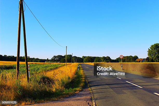 German Country Road Stock Photo - Download Image Now - Agricultural Field, Asphalt, Blue