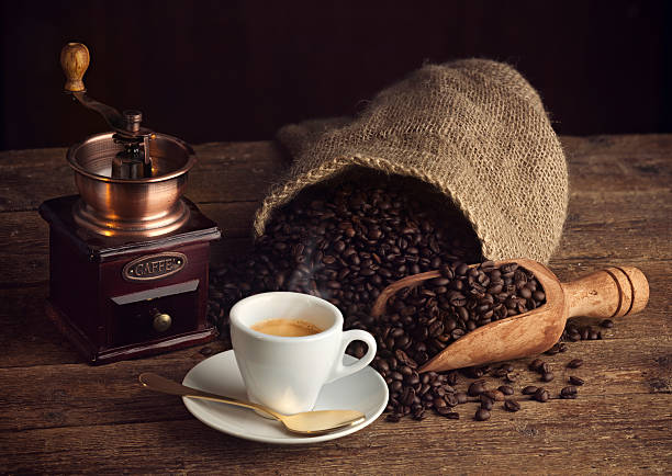 Espresso coffee with old coffee grinder