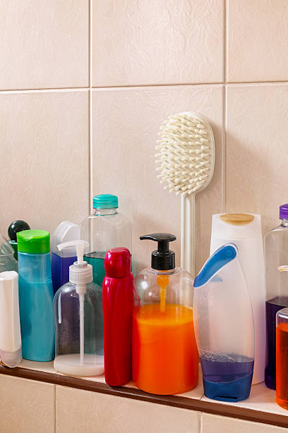 istock Many shampoo and soap bottles on a bathroom shelf. 505056566
