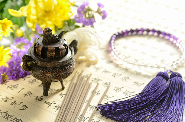 buddhism pray with incense on heart sutra stock photo