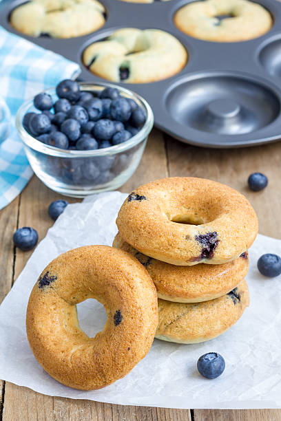 istock Freshly baked doughnuts with blueberries for breakfast 505056988