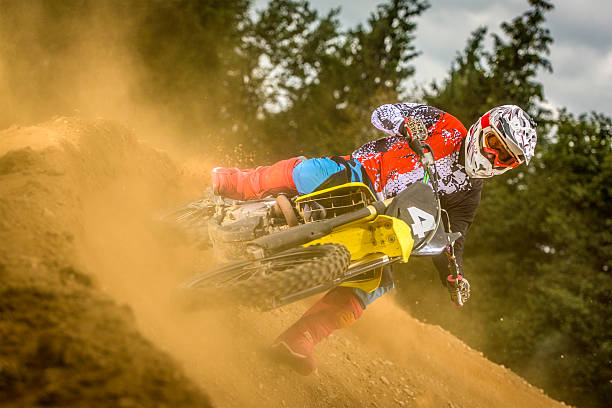 istock Motocross racer spraying dirt 505057628