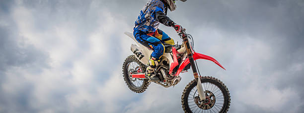 istock Motocross biker in the air 505057854