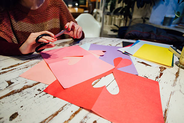 istock cutting out paper heart 505060514