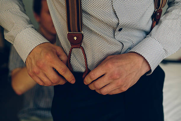 istock groom in the morning getting ready 505060888