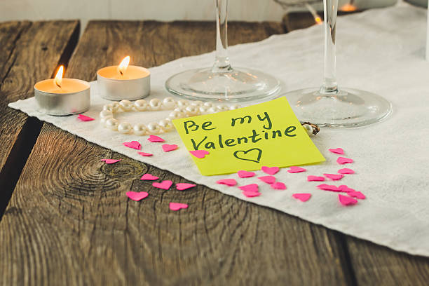 istock Sticky note for Saint Valentine's day and tea lights 505061654