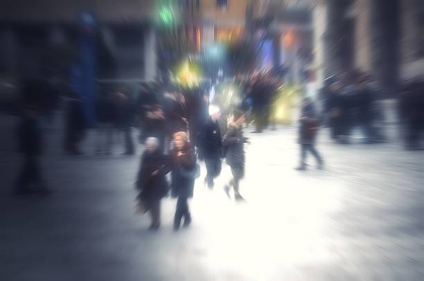 istock Abstract blurred people walking in shopping centre 505062140