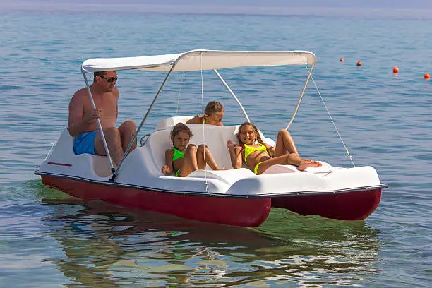 Family on the pedal boat