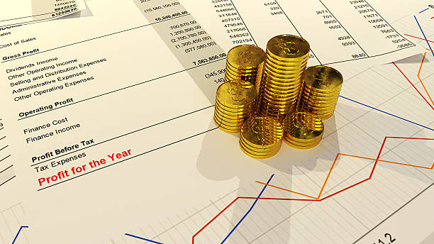 Accounting Profit in an Income Statement with Gold Coins Accounting profit is shown using an income statement (profit and loss account) and gold coins which has US Dollar mark in them goldco minimum investment stock pictures, royalty-free photos & images
