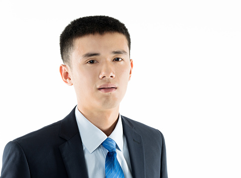 Portrait of an asian businessman isolated on white background.