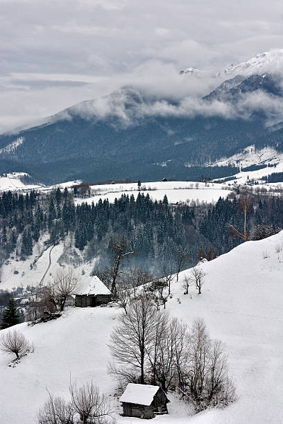 istock winter in romanian Carpathians mountains in a cloudy day. 505064002