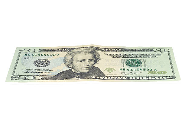istock twenty dollar banknote,isolated on white with clipping path. 505065302