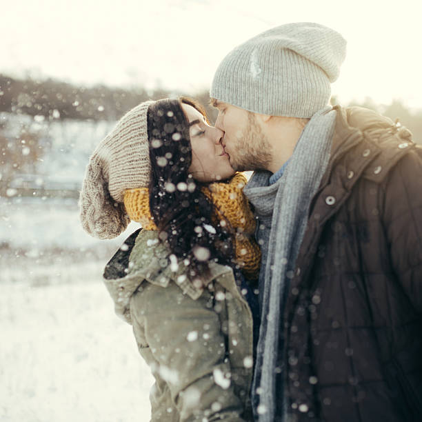 istock Cheerful young couple walking in a winter day 505066334