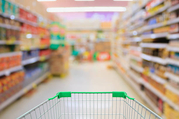 istock Supermarket interior with shopping cart 505068034