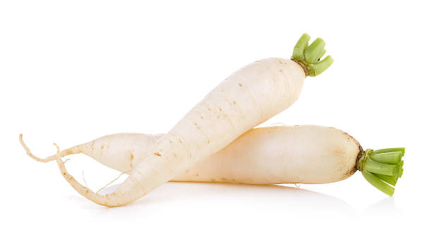 istock Daikon radishes isolated on white background 505068514