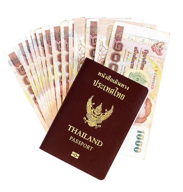 istock Thailand passport with Thai money ready 505069388